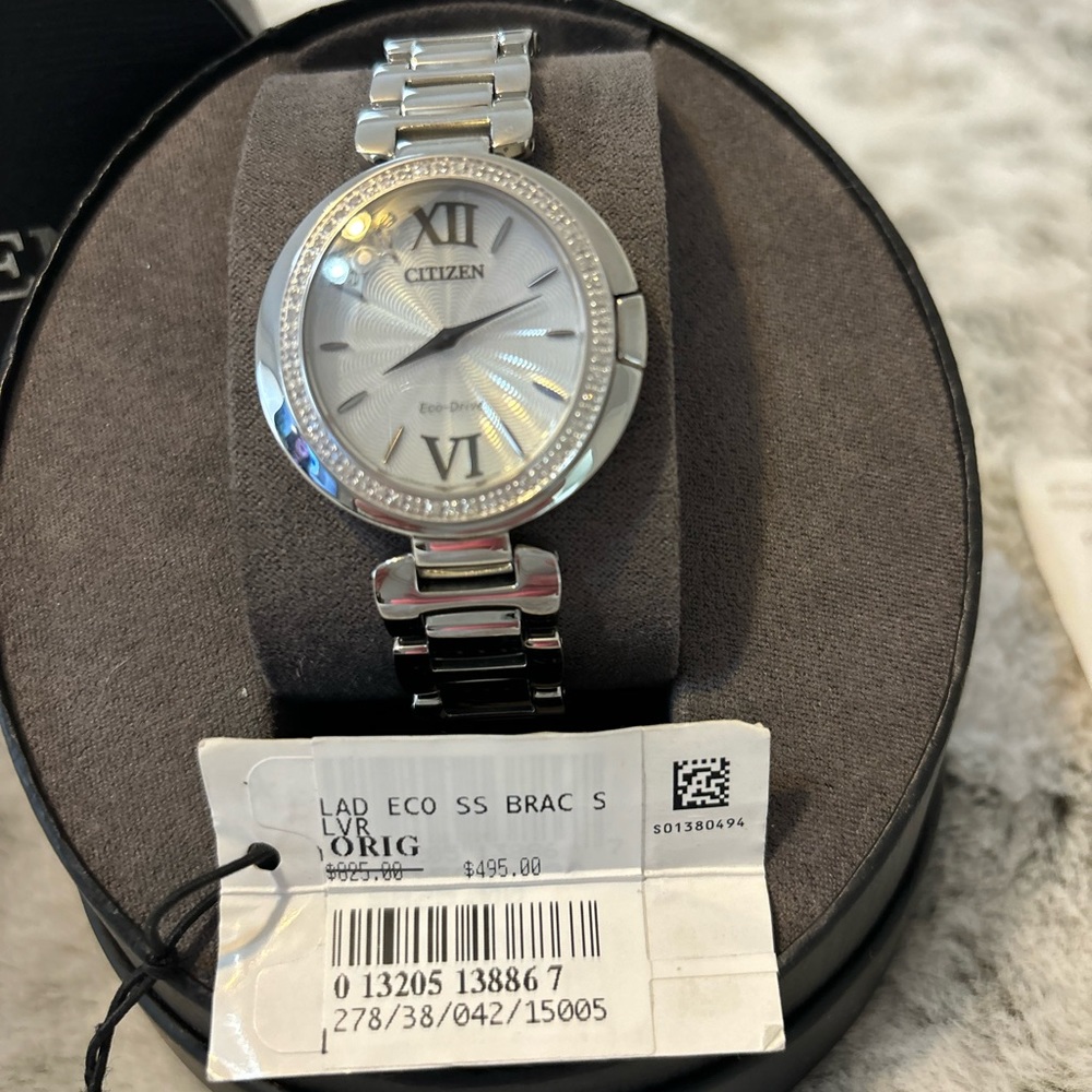Silver and diamond watch- never worn, price tag still on it